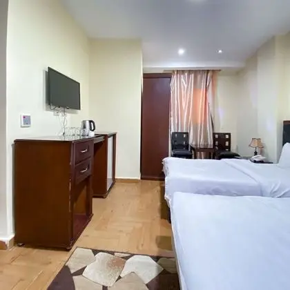 Deluxe Tek Büyük veya İki Ayrı Yataklı Oda