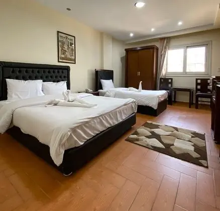 Deluxe Tek Büyük veya İki Ayrı Yataklı Oda