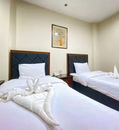 Deluxe Tek Büyük veya İki Ayrı Yataklı Oda