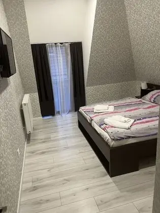 Standard Tek Büyük veya İki Ayrı Yataklı Oda (with extra bed)