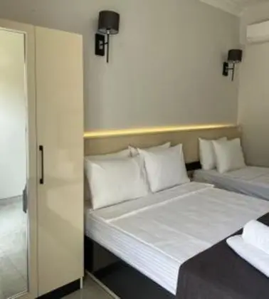 Üç Kişilik Oda, Bahçe Manzaralı, Balkonlu