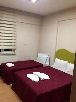 Ekonomik Üç Kişilik Oda