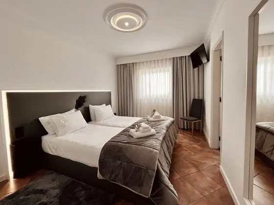 Deluxe Tek Büyük veya İki Ayrı Yataklı Oda