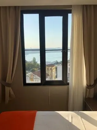 Deluxe Tek Büyük veya İki Ayrı Yataklı Oda, Deniz Manzaralı