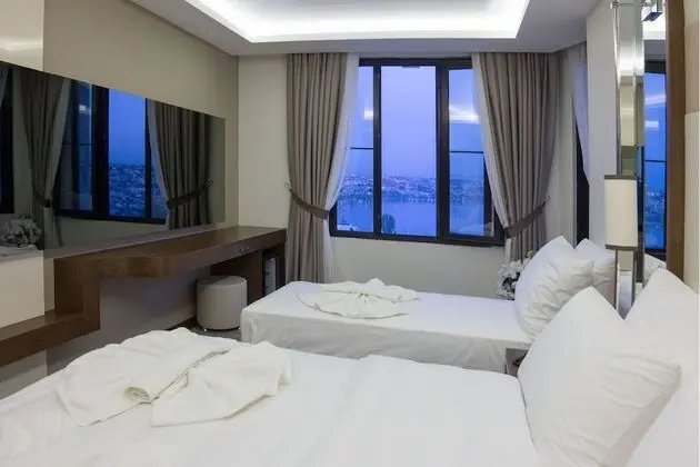 Deluxe Üç Kişilik Oda, Deniz Manzaralı