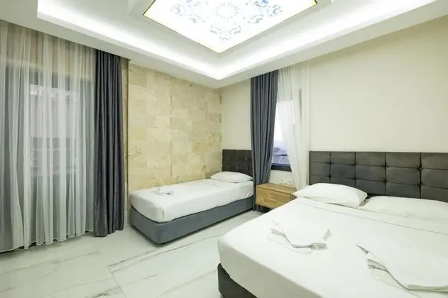 Deluxe Aile Odası, Deniz veya Kara Manzaralı, Balkonlu