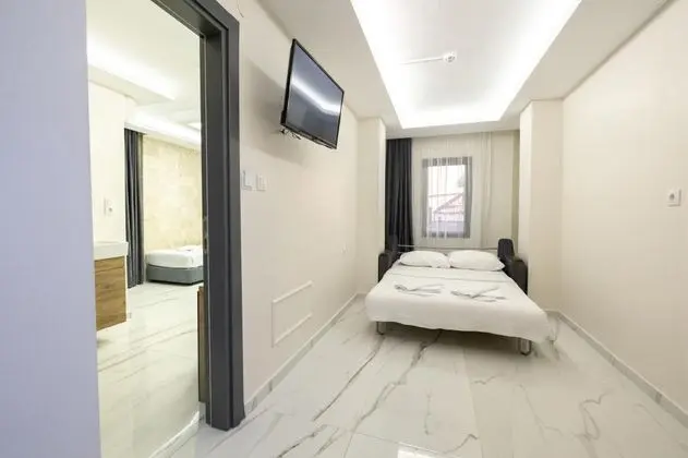Deluxe Aile Odası, Deniz veya Kara Manzaralı, Balkonlu