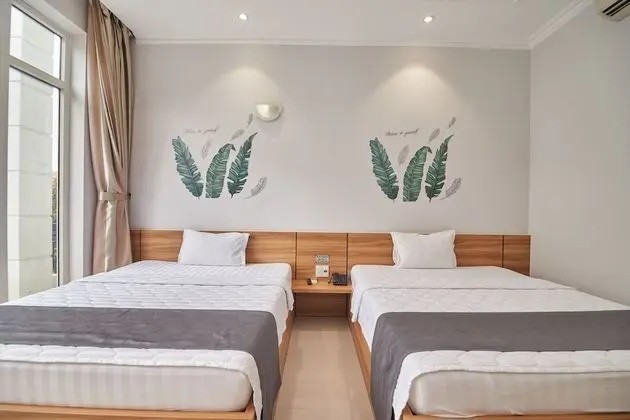 Deluxe Tek Büyük veya İki Ayrı Yataklı Oda