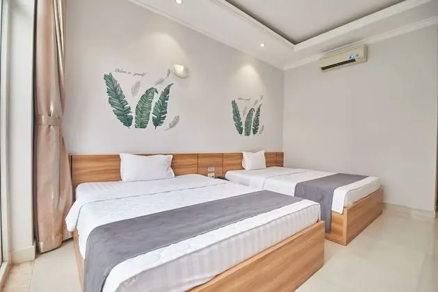Deluxe Tek Büyük veya İki Ayrı Yataklı Oda