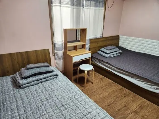 1 x Private Triple Room(Shared Bathroom) (1 Double Bed, 1 Single Bed)