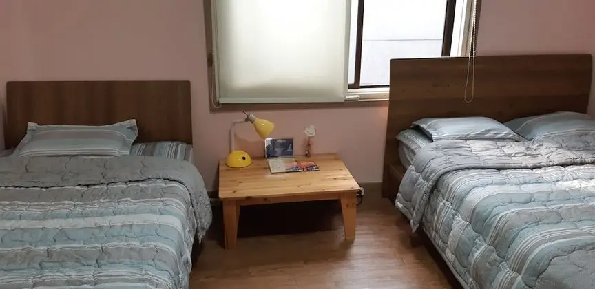 1 x Private Triple Room(Shared Bathroom) (1 Double Bed, 1 Single Bed)