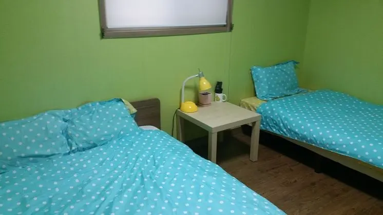 1 x Private Triple Room(Shared Bathroom) (1 Double Bed, 1 Single Bed)