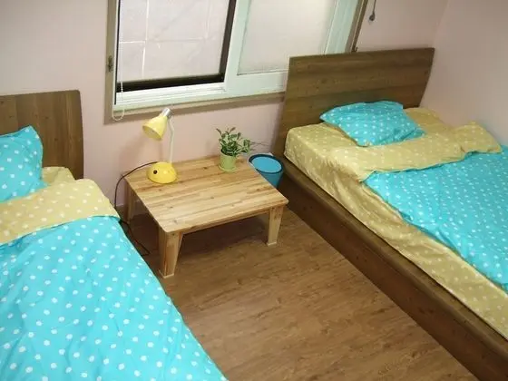 1 x Private Triple Room(Shared Bathroom) (1 Double Bed, 1 Single Bed)