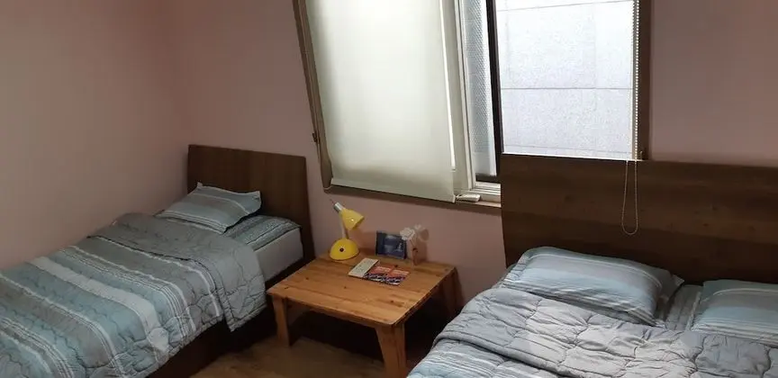 1 x Private Triple Room(Shared Bathroom) (1 Double Bed, 1 Single Bed)