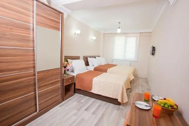 Deluxe Üç Kişilik Oda