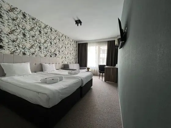 Comfort Tek Büyük veya İki Ayrı Yataklı Oda