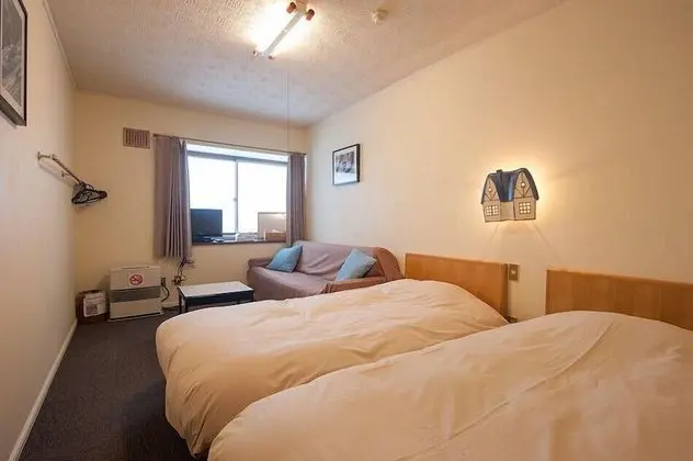 İki Ayrı Yataklı Oda (Western Twin + Extra Bed)