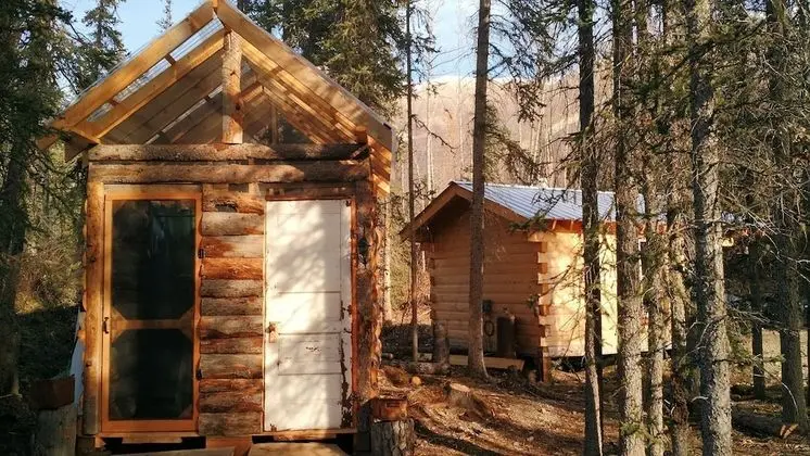 Martin Radovan Cabin w Shared Outhouse