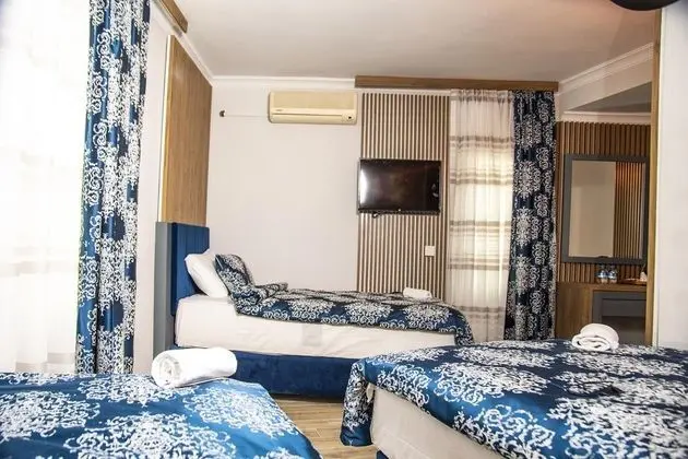 Üç Kişilik Oda