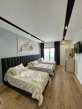 Deluxe Üç Kişilik Oda, Deniz Manzaralı