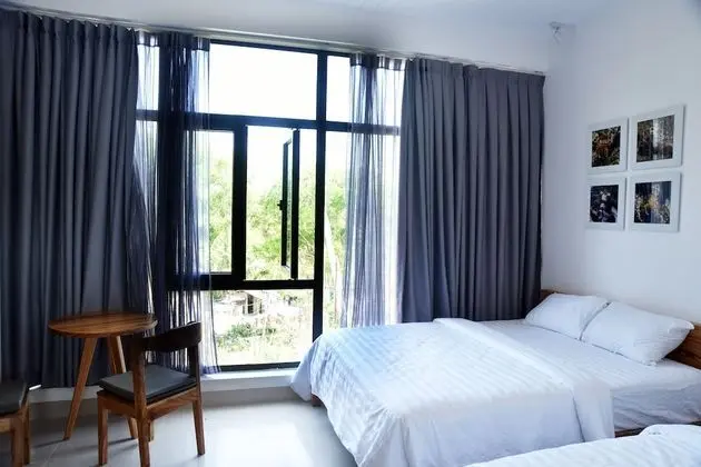 Deluxe Üç Kişilik Oda, Birden Çok Yatak, Plaj Manzaralı
