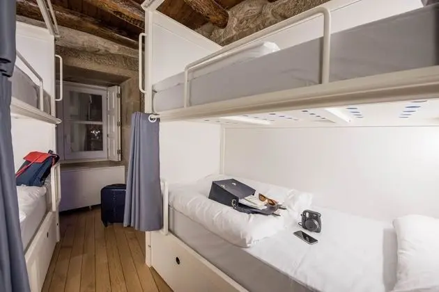 Bed in Shared Bedroom with 4 Beds