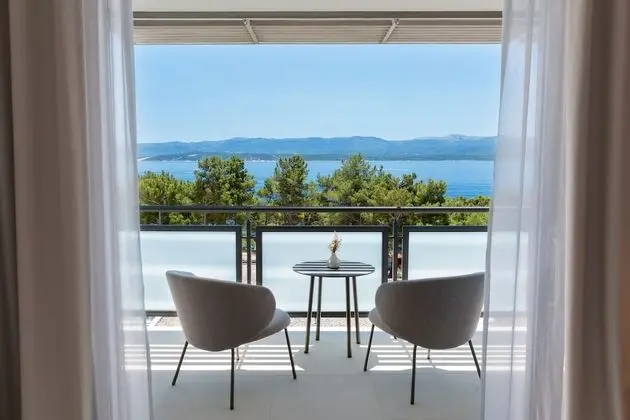 Superior Tek Büyük veya İki Ayrı Yataklı Oda, Balkon, Kısmi Deniz Manzaralı