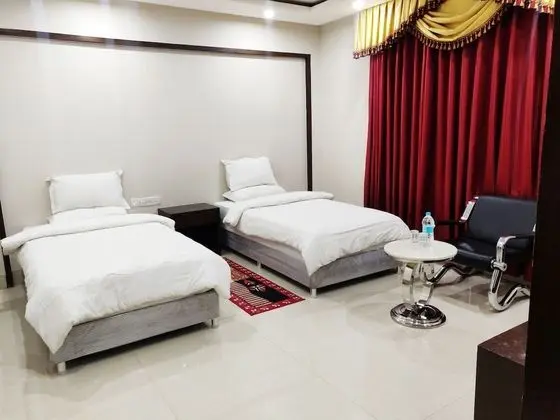 Deluxe Tek Büyük veya İki Ayrı Yataklı Oda