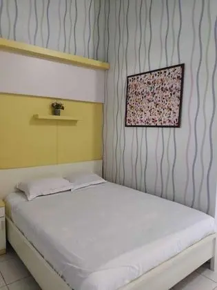 Deluxe Tek Büyük Yataklı Oda (Bukti menikah wajib untuk pasangan)