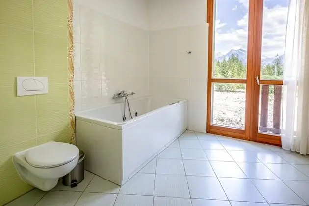 Deluxe Tek Büyük veya İki Ayrı Yataklı Oda