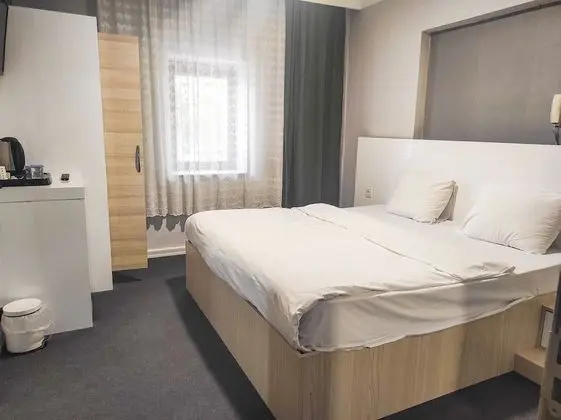 Economy Tek Büyük veya İki Ayrı Yataklı Oda
