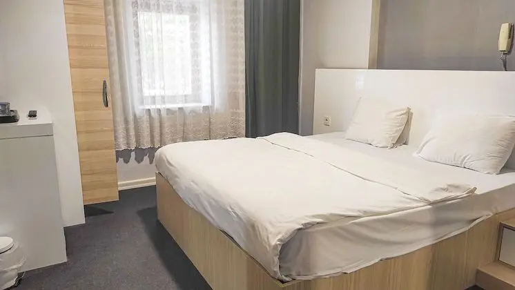 Economy Tek Büyük veya İki Ayrı Yataklı Oda