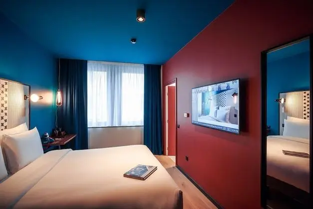 Deluxe Tek Büyük veya İki Ayrı Yataklı Oda (Extra Boma)
