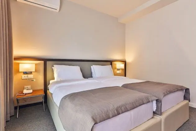 Economy Tek Büyük veya İki Ayrı Yataklı Oda