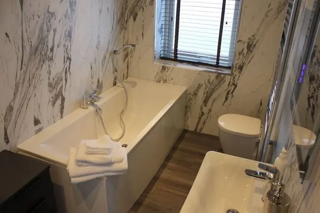 Deluxe Tek Büyük Yataklı Oda, Banyolu/Duşlu