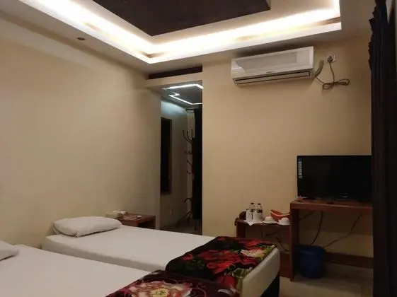 Deluxe Tek Büyük veya İki Ayrı Yataklı Oda, Birden Çok Yatak Odası, Bahçe Manzaralı