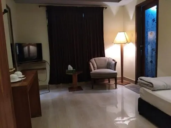 Deluxe Tek Büyük veya İki Ayrı Yataklı Oda, Birden Çok Yatak Odası, Bahçe Manzaralı