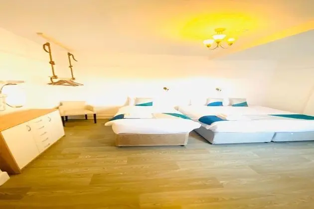 Deluxe Üç Kişilik Oda, Birden Çok Yatak
