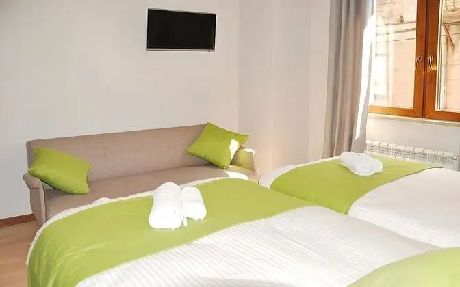 Deluxe Tek Büyük veya İki Ayrı Yataklı Oda