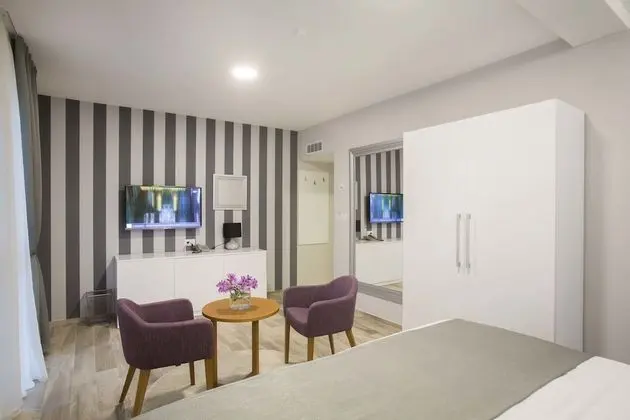 Deluxe Tek Büyük veya İki Ayrı Yataklı Oda