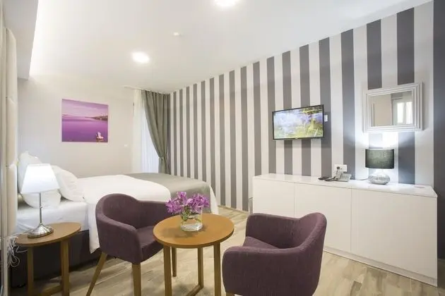 Deluxe Tek Büyük veya İki Ayrı Yataklı Oda, Balkon