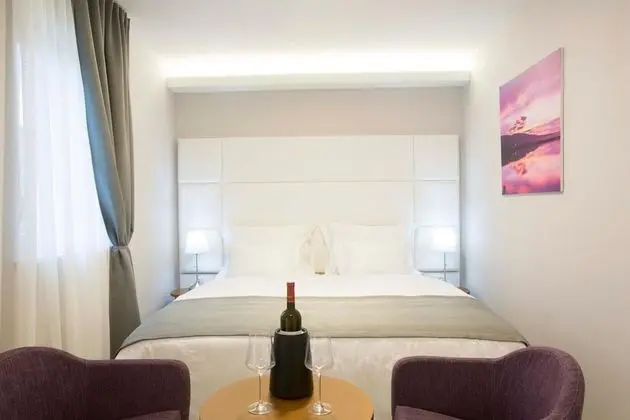 Deluxe Tek Büyük veya İki Ayrı Yataklı Oda, Balkon