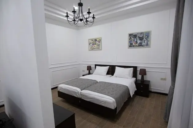 Deluxe Tek Büyük veya İki Ayrı Yataklı Oda