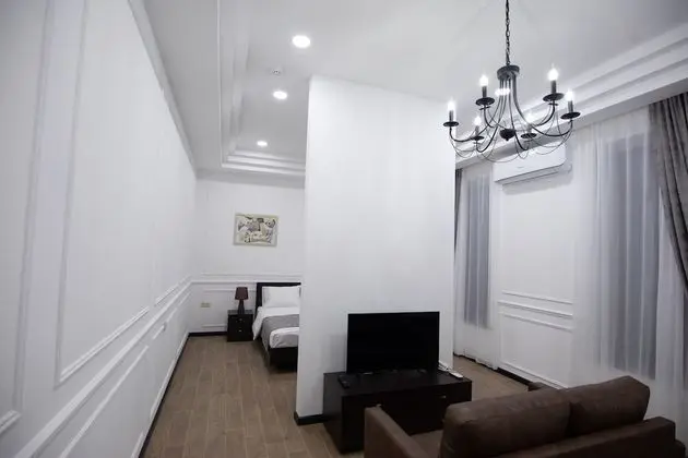 Deluxe Tek Büyük veya İki Ayrı Yataklı Oda