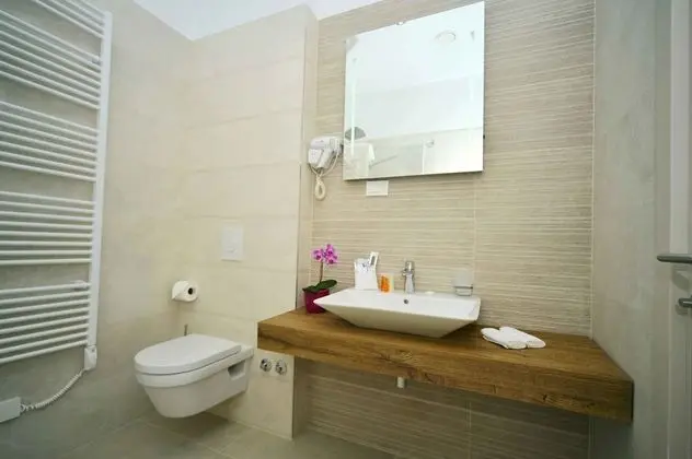 Deluxe Tek Büyük veya İki Ayrı Yataklı Oda