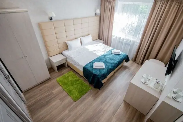 Deluxe Tek Büyük veya İki Ayrı Yataklı Oda