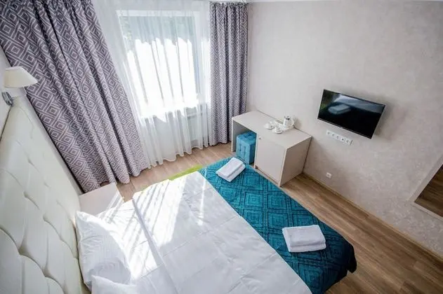 Deluxe Tek Büyük veya İki Ayrı Yataklı Oda