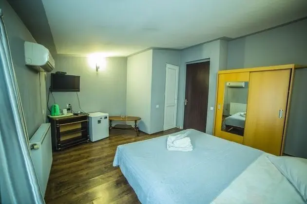 Economy Tek Büyük veya İki Ayrı Yataklı Oda