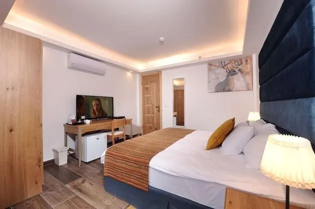 Deluxe Üç Kişilik Oda