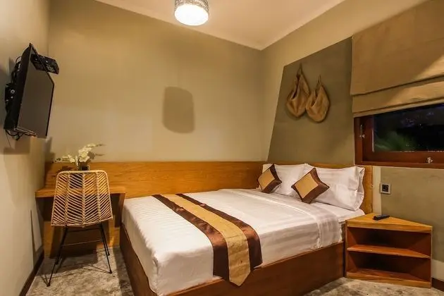 Deluxe Tek Büyük veya İki Ayrı Yataklı Oda